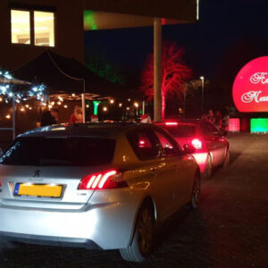 PeakIT uitreiking kerstpaketten drivethru buitenshow projectiebol ledtanks 4 scaled